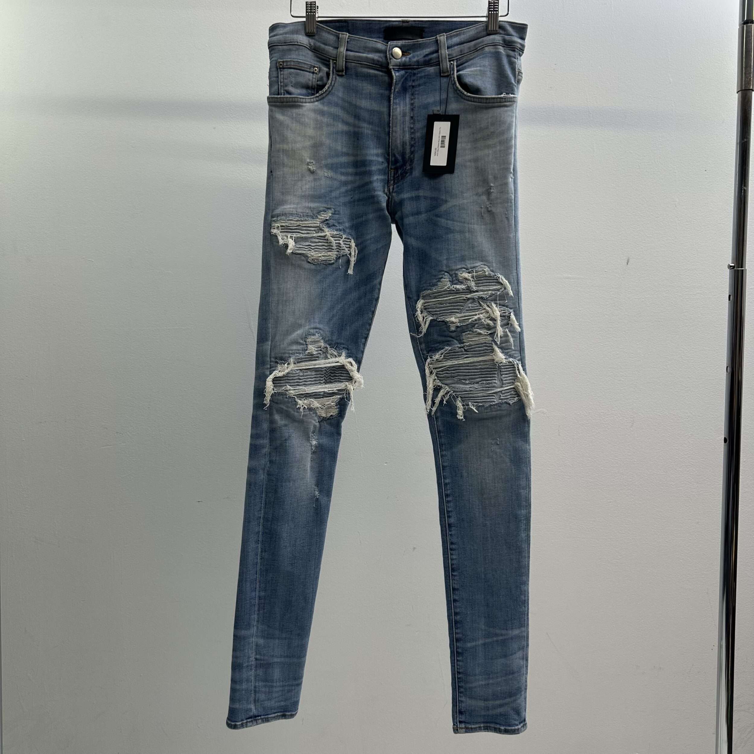 Amiri Distressed Ribbed Patch Jeans